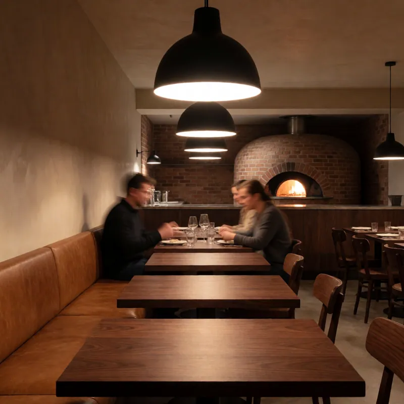 The dining room in the evening at Woodside Pizza, Woodside NY