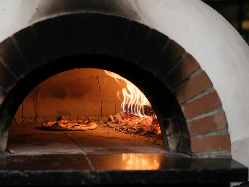 The coal-fired brick oven at Woodside Pizza in Woodside, New York